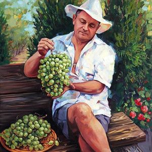 Портрет мужчины с гроздью винограда